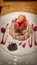 Paleo Diet meringue with fruit and raspberry sauce