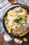 Paleo Food: Cauliflower rice with eggs closeup. vertical top vie