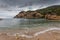 Paleokastritsa bay cliffs and beach on a rainy day