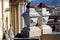 Palermo, Italy - close-up image of concrete planters with the statues of the facade of the  church of San Domenico in the backgrou