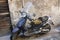 Palermo, Italy - October 16, 2016: scooter with ruined saddle abandoned along the street