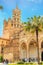 Palermo, Sicily, Italy - Apr 11th 2019: Palermo Cathedral exterior with people standing in front of building. Roman Catholic
