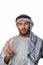 Palestinian Arab man showing peace sign and standing against isolated white background