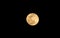 Palestinian boy places a muzzle on a destination as a precautionary measure against the Coronavirus, during the moon`s rise in the