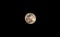 Palestinian boy places a muzzle on a destination as a precautionary measure against the Coronavirus, during the moon`s rise in the