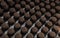 Palestinian child, Nader Qeshta a 12-year-old, turns olive pomace dried into small molds used for heating during the winter seas