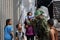 Palestinian fighters with Qassam Brigades, the armed wing of the Hamas movement, distribute protective masks to people amid the Co