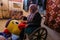 A Palestinian man and his two-seat wife work in making dolls to overcome the bad economic situation imposed on Gaza for many years