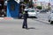 The Palestinian police organizes the traffic wearing a precautionary mask against the Coronavirus