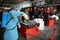 Palestinian worker sprinkles disinfectant in a mall in Gaza City as a measure to prevent the spread of the new Corona virus