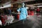 Palestinian worker sprinkles disinfectant in a mall in Gaza City as a measure to prevent the spread of the new Corona virus