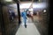 Palestinian worker sprinkles disinfectant in a mall in Gaza City as a measure to prevent the spread of the new Corona virus