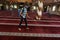 Palestinian youth performs cleansing work, a amid the outbreak of the Coronavirus Covid19, in the `Badr` mosque before the first