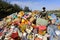 Palestinian youths collect plastic and metal from garbage piles in the town of Khan Yunis, in the southern Gaza Strip