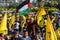 Palestinians participate in commemorating the 18th anniversary of the death of the founder of the Fatah movement and the head of t