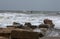 Palestinians are on the seashore during the entry of rain storm clouds and polar weather in Gaza Strip