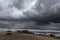 Palestinians are on the seashore during the entry of rain storm clouds and polar weather in Gaza Strip