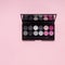 Palette of pink and grey cosmetic make up, eye shadow palette, colorful shadows texture