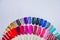 Palette with swatches of nail Polish. a collection of samples of varnish for manicure. well-groomed hands, healthy nails