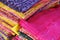 Pallet of vivid and colorful Indian Sari, India textile, selective focus