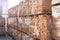 Pallets with bricks in the building store. Racks with brick. Masonry, stonework. Several pallets with concrete brick stacked on