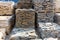 Pallets with natural stone tiles in a warehouse of brick factory