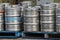 Pallets of steel beer kegs.