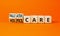 Palliative or hospice care symbol. Concept word Palliative care Hospice care on wooden cubes. Beautiful orange table orange