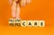 Palliative or hospice care symbol. Concept word Palliative care Hospice care on wooden cubes. Doctor hand. Beautiful orange