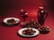 Palm dates fruit with a glass & jug of juice on posh red carpet background for Iftar. Ramadan Kareem. Islamic background. Copy