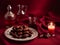 Palm dates fruit with a glass & jug of juice on posh red carpet background for Iftar. Ramadan Kareem. Islamic background. Copy