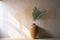 palm interior sunlight shadows concrete vase tree home palm design decor wall. Generative AI.