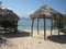 Palm Leaf Huts on Beach