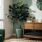 Palm leaf on a modern, teal sideboard with drawers in a luxurious, green living room interior with golden decorations and an uphol