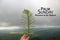 Palm Sunday quote - Hosanna in The Highest. Palm Sunday background with person holding green palm leaf in hand on blue gloomy sky.