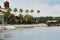 Palm tree lined pond at Disney Springs in downtown Disney Orlando, Florida.