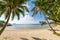 Palm trees on beautiful tropical beach on Koh Kood island