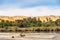 Palm trees and greenery on the banks of the River Nile in Egypt