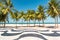 Palm trees and the iconic Copacabana beach mosaic sidewalk