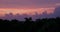 Palm trees at purple sunset sky, Dominican Republic.