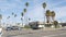 Palm trees on Route 101 highway, pacific coast, Oceanside, California USA. Suburb road intersection