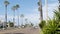 Palm trees on Route 101 highway, pacific coast, Oceanside, California USA. Suburb road intersection.