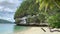 Palm Trees On Sandy Ocean Beach With Turquoise Water In Kaimana Island. Beautiful Nature With Picturesque View.