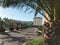 Palm trees on a street in sleeping quarters of Adler city, Russia