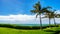 Palm trees swaying in the wind under blue sky