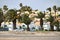 The palm trees and a white houses of Castillo Caleta de Fuste in Fuerteventura, Canary islands.