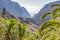 Between the palm trees you have views of the rugged mountains around Masca and a small piece of the island of La Gomera, Tenerife,