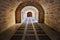 Palma cathedral ancient brick passageway with arches and iron gate, mallorca, spain