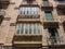 Palma de Mallorca, Spain. The typical balconies on the facades of the buildings and houses in the old city center