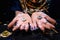 On the palms of the fortune teller are runes. Close-up. Above the hands is a zodiac astrological circle. The concept of divination